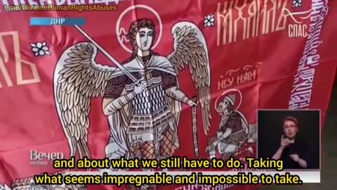 A Russian unit carries a replica of the banner of Joshua and Archangel Michael