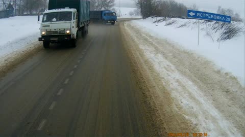 Trucker Driver Loses Control on Icy Road