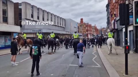 Police forced to ride into MDL thugs as they move to attack Enough Is Enough protestors in Bolton.