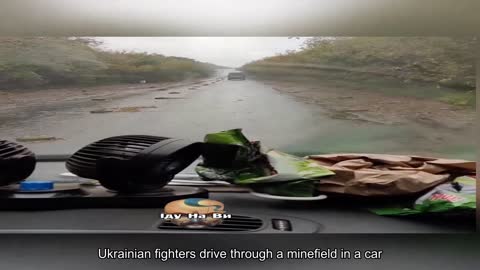 Ukrainian fighters drive through a minefield with 300 anti-tank mines in a car