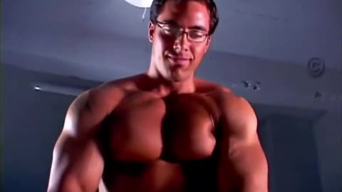Muscular Man Taking Off His Shirt