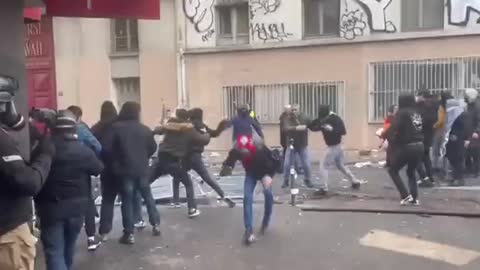 Paris, Kurds are literally smashing up the roads and throwing