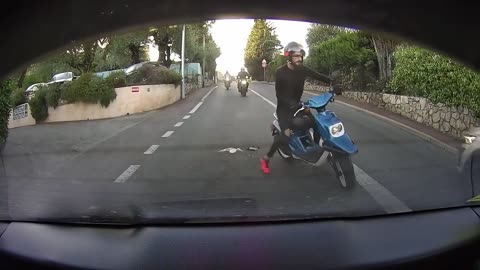 Collision as Guy Rear-Ends Car While Woman Makes Sudden Stop on Scooter