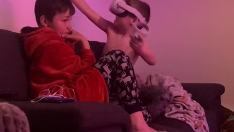 Little Brother Playing Oculus VR Whacks Older Brother in Mishap