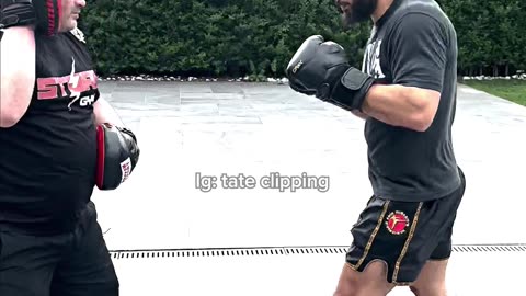 Tate sparring with his KICKBOXING coach