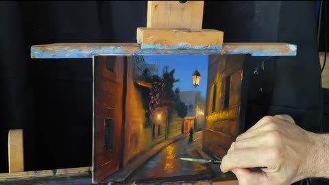 Painting a night scene in an old medieval city