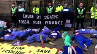 Doctors stage climate change protest outside JP Morgan