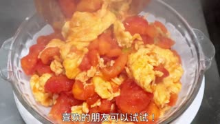 See how the chef makes scrambled eggs with tomatoes