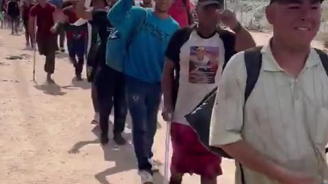 WE ARE BEING INVADED! Watch Hundreds of Illegals Cross The Border Waving To Cameras...