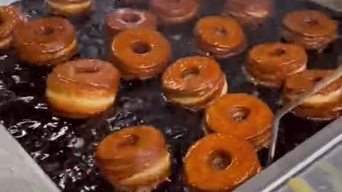 Hot fresh glazed donuts for everyone. Do you like donuts Friendly Donuts in Orange