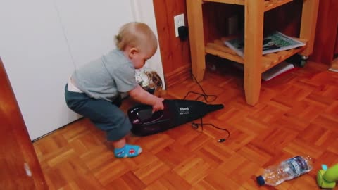 Baby Plays With Dustbuster, Freaks Out When It Turns On