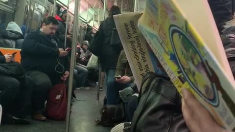 Drunk guy on subway train yells about living with a fat guy