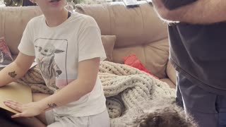 Girl Surprised by Holiday Puppy Present