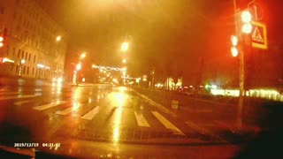Car Flies Through Traffic Light