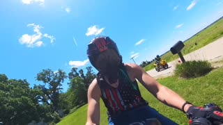 Motorcyclist's Grassy Dismount