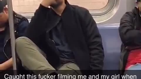 Man films guy and his girlfriend sleeping on subway train and tries to pretend he didn't