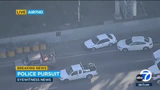 Meanwhile, Previously- A fleeing driver narrowly missed hitting several cars in East LA