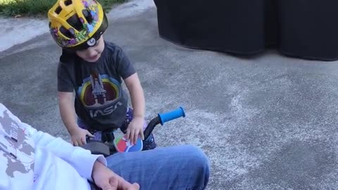 Finley riding first bike