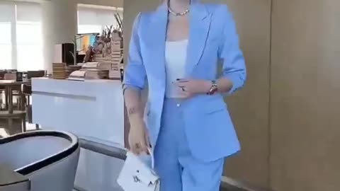 Sky blue suit with white high heels