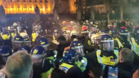 Police Clash with Protesters in Parliament Square as the Million Mask March