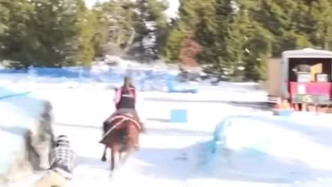 Waterskiing on snow behind a horse (crazy or not)