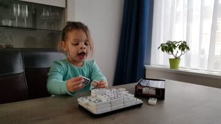 Little girl singing Happy Birthday