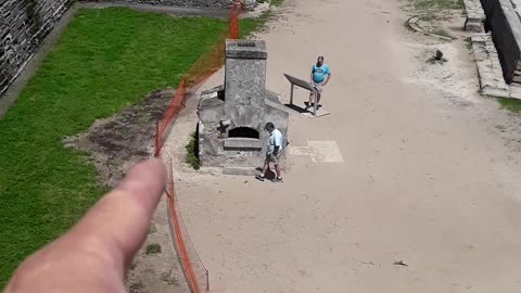 The flag of Spain in the 1500's and Castillo De San Marcos Fort.