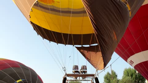 Hot air balloon and fire flames