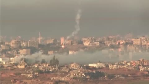 Gaza skyline shrouded in thick smoke plumes