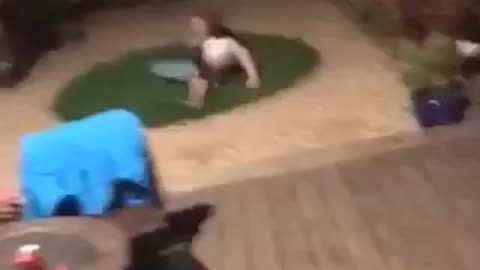 Guy attempts front flip into grass circle fails