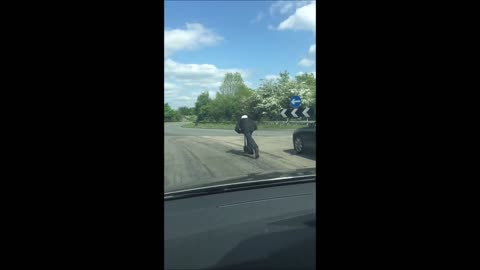 Old Man Cruises on Scooter, Lives the Dream