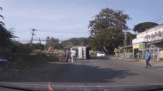 Loaded Truck Takes Turn Too Fast