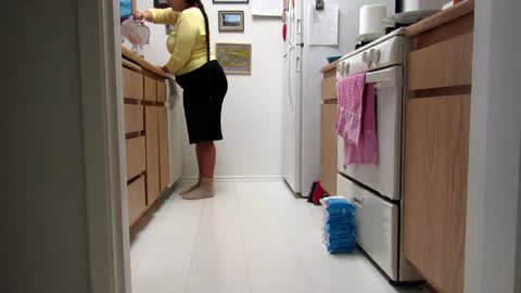 Woman With A Long Braid Pours A Smoothie