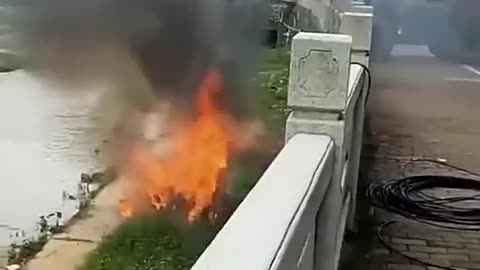 Electric car catches fire