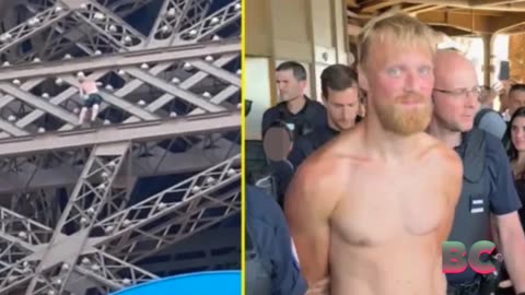 Man held for climbing Eiffel Tower on final Olympics day