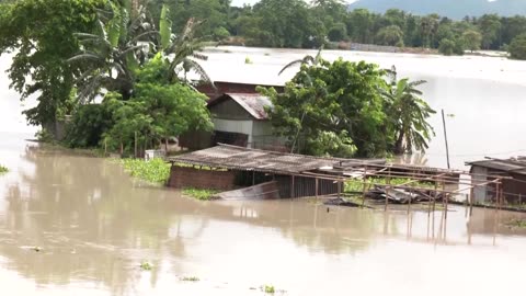 Floods inundate villages, city streets in northeast India