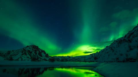 Stunning footage in the mountains shows the northern lights dancing across the sky