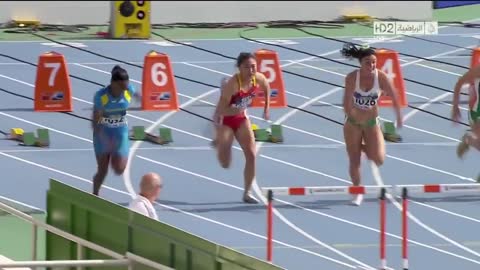 Michelle Jenneke dancing as hell before the 100m hurdles