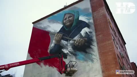 Graffiti with the image of a grandmother with a red banner appeared on the wall of a house in Reutov