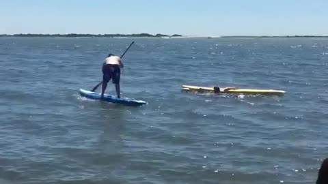 Collab copyright protection - blue shorts blue paddle board fail