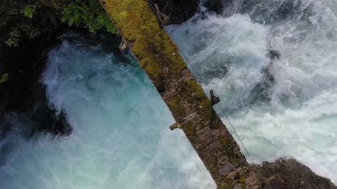 suspension bridge over the mountain river beautiful nature norway natural landscape