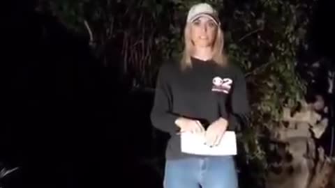 Mountain Lion walks past reporter live on the air. She thinks its a DOG