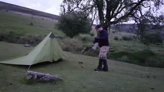 Putting up a lightweight trekking pole tent. Dartmoor wildcamping