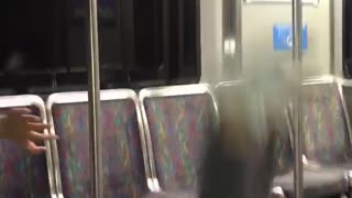 Guy falls on subway pole