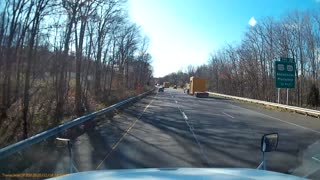 Semi Truck Loses Panel on Highway