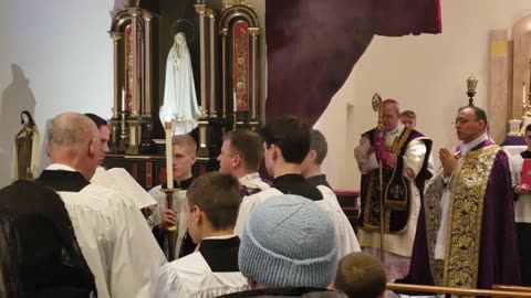 Chanting the Gospel at Pontifical Mass with Bishop Athanasius Schneider