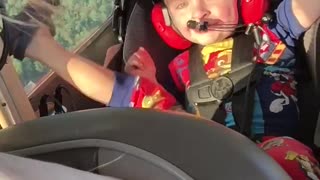 Laughing flying toddler
