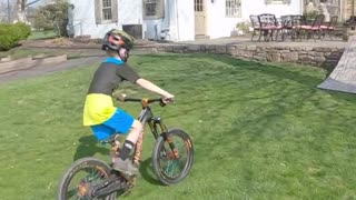 Boy Races Through Homemade BMX Track