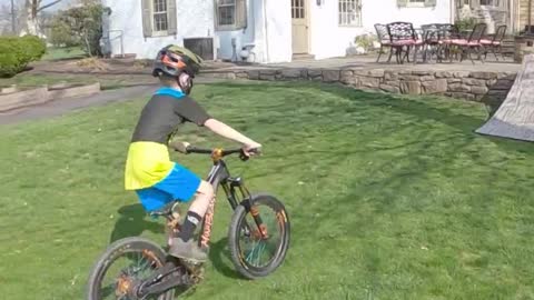 Boy Races Through Homemade BMX Track