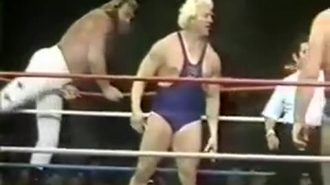 Andre the Giant gets a free hair cut from Studd & Patera